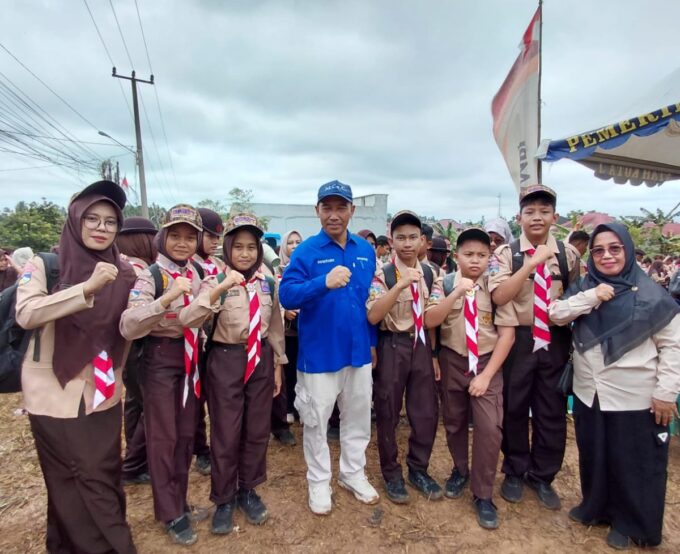 Anggota Pramuka SMP 017 Jambi Ikuti Kegiatan Tanam Serentak Padi Gogo